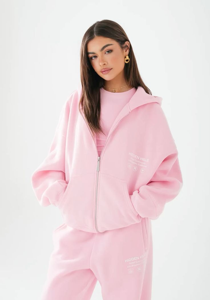 Trendy women's hoodies collection featuring a stylish pink zip-up design for casual wear