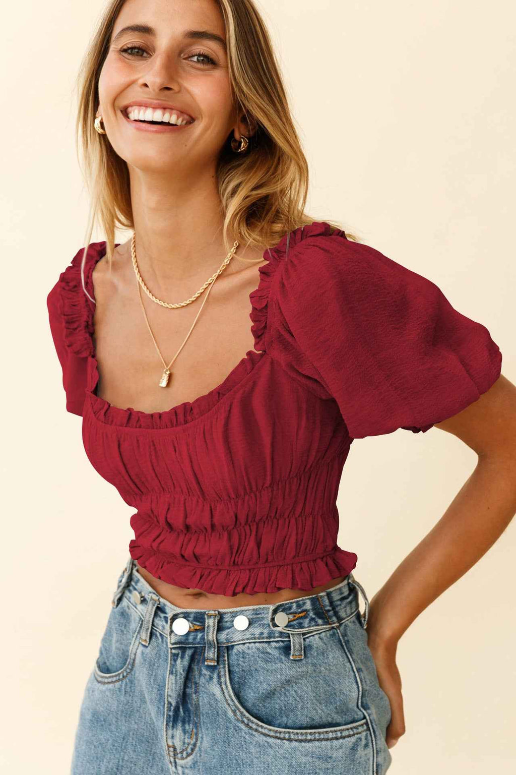 Midol summer pleated lantern sleeve top in burgundy with a flattering fit and ruffled details